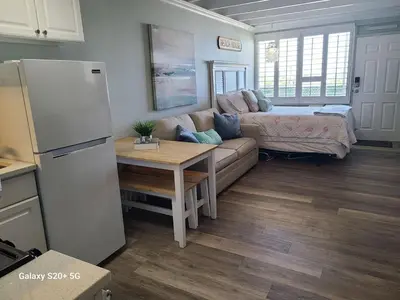 a living room with a couch and a table at Fontainebleau Terrace #430 in Panama City Beach