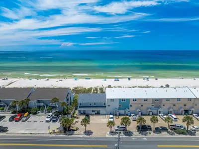 an aerial view of a hotel and the beach at Beachside West Villa #2 by Emerald Coast Retreats in Panama City Beach