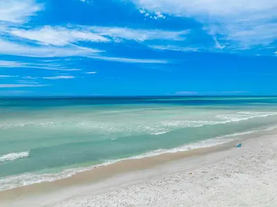 a view of a beach with the ocean at Beachside West Villa #2 by Emerald Coast Retreats in Panama City Beach