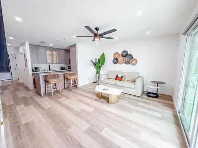 a living room with a couch and a table at Ocean Breeze 5A in Panama City Beach