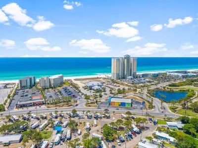 an aerial view of a parking lot next to the beach at Top of the Gulf 507 Beach Front Resort Ocean View in Panama City Beach