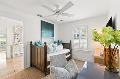 a living room with a bed and a table at 30A Sunset Beach House - Villa Infinity by Panhandle Getaways in Seacrest