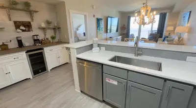a kitchen with a sink and a counter top at Calypso 3-2007 by Emerald Coast Retreats in Panama City Beach