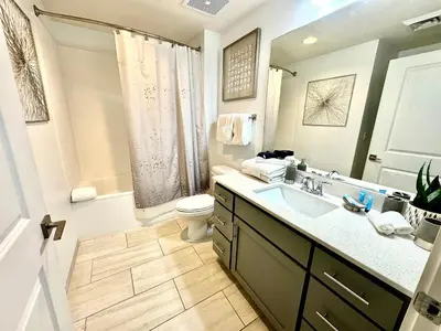 a bathroom with a sink and a toilet at Calypso 3-2112 by Emerald Coast Retreats in Panama City Beach