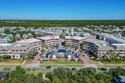 an aerial view of a resort with a parking lot at The Village Blue Haven Condo - Private Beach Access Pool & Hot Tub in Rosemary Beach