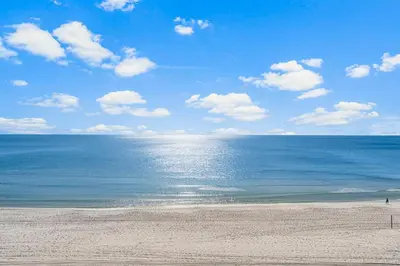 a view of the ocean from the beach at Tiki Time 702 by Beach Haven Vacation Rentals in Panama City Beach