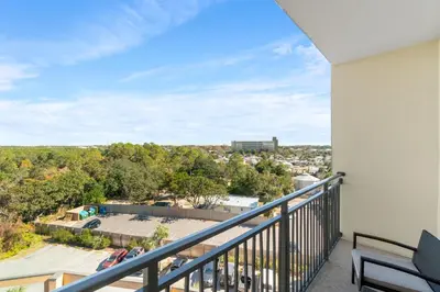 a balcony with a view of a city at Origin 0623 - Studio King- Amazing Value - City View by Beach Haven Vacation Rentals in Panama City Beach