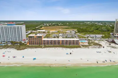 an aerial view of a resort on a beach at Sharkys Retreat 701 by Beach Haven Vacation Rentals in Panama City Beach