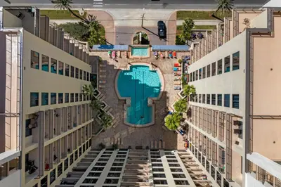 an aerial view of the pool at the resort at Origin 1231 - One Bedroom - Sunrise and Gulf Views by Beach Haven Vacation Rentals in Panama City Beach