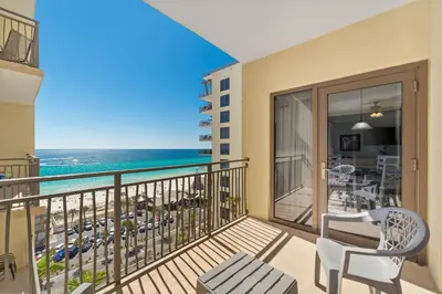 a balcony with a view of the ocean at Origin 1024 - One Bedroom - Sunny Pool Deck & Gulf Views by Beach Haven Vacation Rentals in Panama City Beach