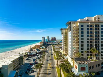 an aerial view of the beach and buildings at Origin 1005 - Studio King - Stunning Gulf Views by Beach Haven Vacation Rentals in Panama City Beach