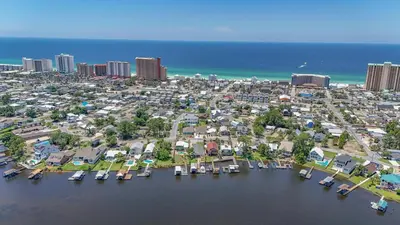 an aerial view of a city next to the ocean at Boat dock and jet ski pad! bring your boat! in Panama City Beach
