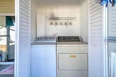 a kitchen with a stove and a stove top oven at Enjoy your quiet vacation at Butler's Beach Retreat! in Panama City Beach
