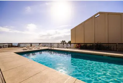 a swimming pool on top of a building at Sandy Shenanigans by Blu Skye! -New to Management 2025! in Panama City Beach