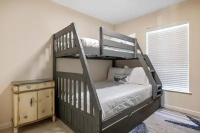 a bedroom with two bunk beds in a room at New! Iguana Palms - Private beach - Pet Freindly! in Panama City Beach