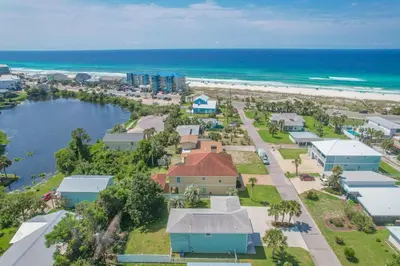 an aerial view of the beach and the ocean at New! Iguana Palms - Private beach - Pet Freindly! in Panama City Beach