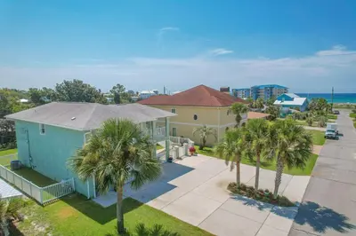 an aerial view of a house with palm trees at New! Iguana Palms - Private beach - Pet Freindly! in Panama City Beach