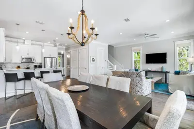 a dining room and kitchen with a table and chairs at Amaryllis Point - 30A, Private Pool, Bicycles, 3 King Masters! in Rosemary Beach