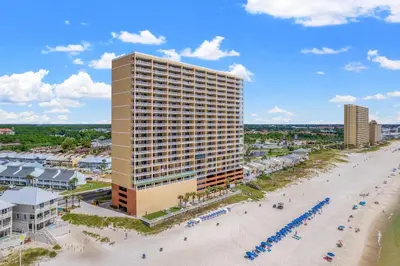 an aerial view of a hotel and the beach at Tropic Winds 2101 in Panama City Beach