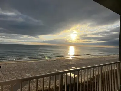 a view of the beach from the balcony of a condo at Panama City Beach, Beach Front Condo 207 in Panama City Beach