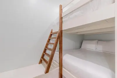 a bunk bed with a ladder in a room at 9 E Willow Mist in Preserve at Inlet Beach in Inlet Beach