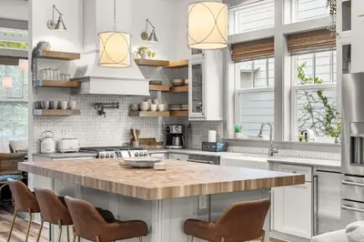 a kitchen with a large island with a counter top at Blue Porch Paradise in Inlet Beach