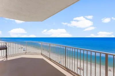 a balcony with a view of the ocean at Treasure Island #0401 in Panama City Beach