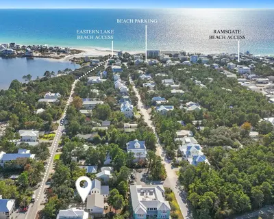 an aerial view of a neighborhood with the ocean at Beach & Bubbles in Santa Rosa Beach
