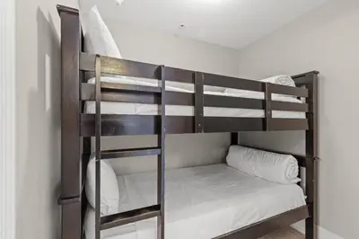 a couple of bunk beds in a room at Tidewater 2615 in Panama City Beach