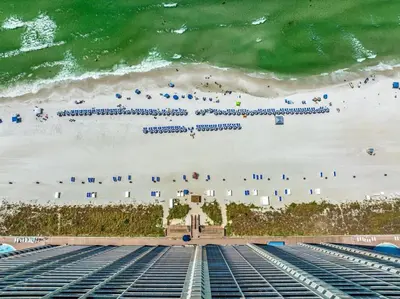 an aerial view of a beach with chairs and umbrellas at Tidewater 2615 in Panama City Beach
