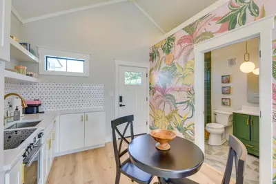 a kitchen with a table with a bowl on it at Walk to Laguna Beach Modern Studio in PCB! in Panama City Beach