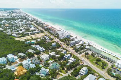 an aerial view of a beach with houses and the ocean at 30A Seacrest Beach Access PoolGolf CartBikes in Inlet Beach
