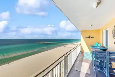 a balcony with a view of the beach at Sterling Reef 902 in Panama City Beach
