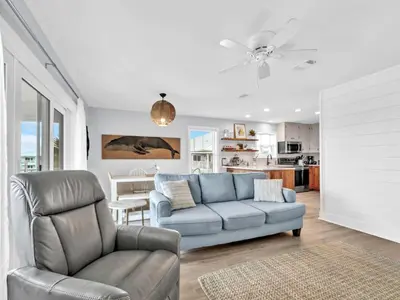a living room with a couch and a chair at Beachside Villas 1131 in Santa Rosa Beach