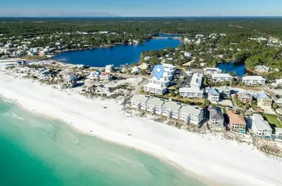 an aerial view of the beach and buildings at Beachside Villas 214 in Santa Rosa Beach