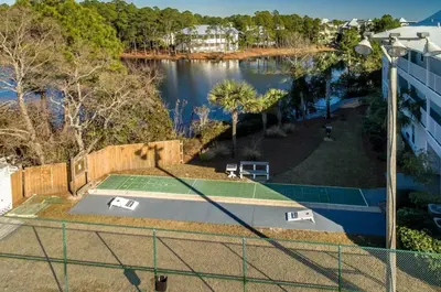 an aerial view of a tennis court with a golf ball at Beachside Villas 214 in Santa Rosa Beach