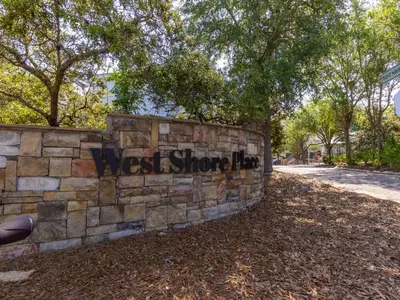 a stone wall with the words westborough written on it at The Pink Flamingo in Rosemary Beach