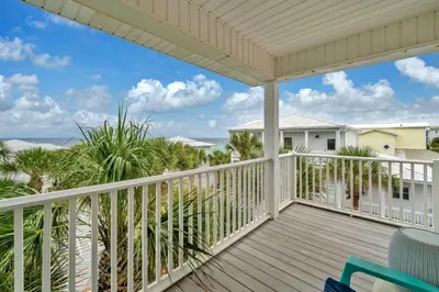 a balcony with a view of the ocean at Grouper Therapy in Santa Rosa Beach