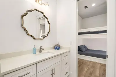 a bathroom with a sink and a mirror at Casa DAzure by Travel Life Vacations in Santa Rosa Beach