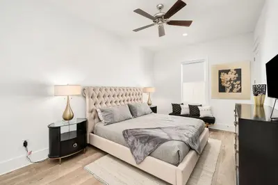 a bedroom with a bed and a ceiling fan at Casa DAzure by Travel Life Vacations in Santa Rosa Beach
