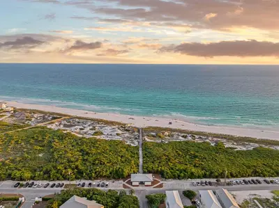an aerial view of a beach and the ocean at Palm Royale by Travel Life Vacations in Inlet Beach