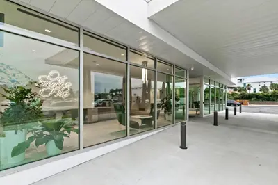 a store front with glass windows on a building at One Seagrove Place 0904 in Santa Rosa Beach