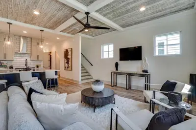 a living room with a couch and a table at No Bad Day on 30A in Inlet Beach