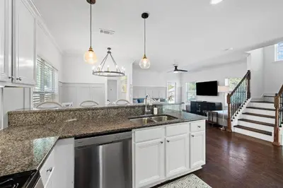 a kitchen with a sink and a counter top at Beach Bliss in Inlet Beach