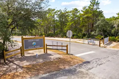 a sign for the desertunit entrance to a road at Forever Grateful in Inlet Beach