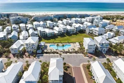 an aerial view of a resort near the beach at The Tipsy Turtle in Inlet Beach