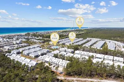 an aerial view of a resort with hot air balloons at The Tipsy Turtle in Inlet Beach