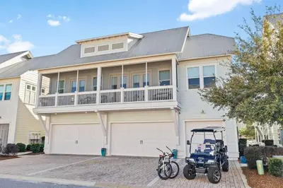 a stroller parked in front of a house at Lovely Day on 30A in Inlet Beach