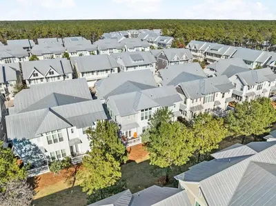 an overhead view of a row of houses with roofs at Lovely Day on 30A in Inlet Beach