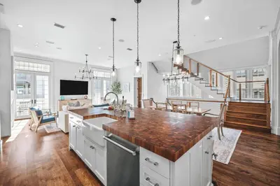 a kitchen with a sink and a counter top at Sadie's Cottage in Rosemary Beach